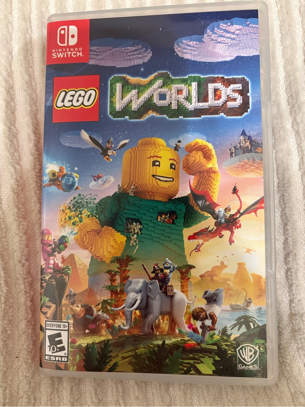 LEGO Worlds for Nintendo Switch - Yellow & Green Cover Art